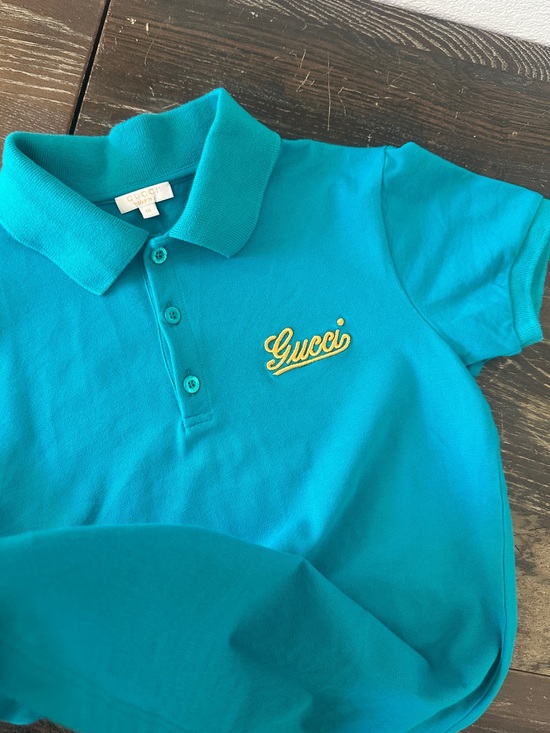 Gucci Other - GUCCI 🦋 Kids Turquoise Polo with Yellow Script Logo